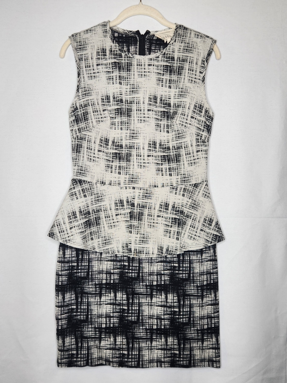 Sleeveless Black and White Peplum Pencil Dress